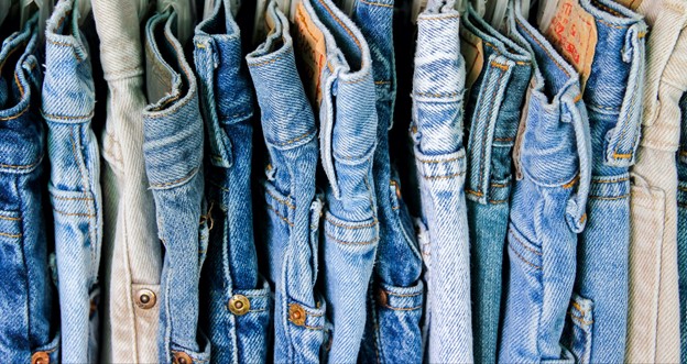 an array of different coloured jeans